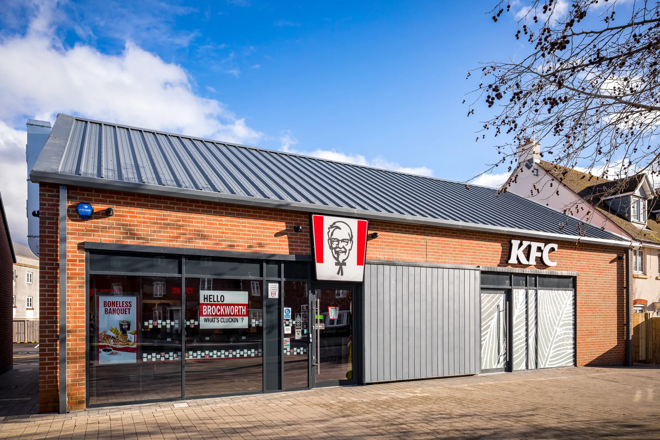 Steel-framed Tesco Express and KFC retail development under construction, GL3