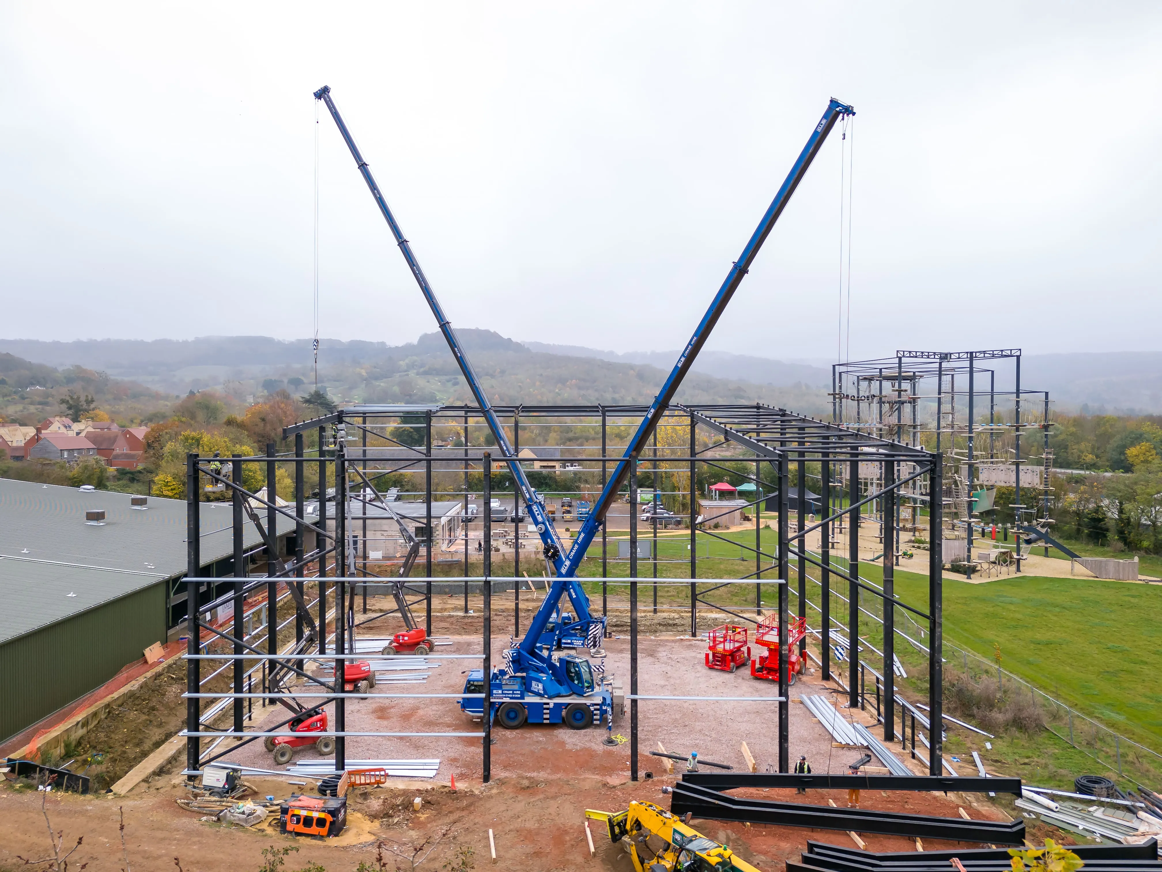 Two mobile cranes erecting a steel portal frame building for MSB Group