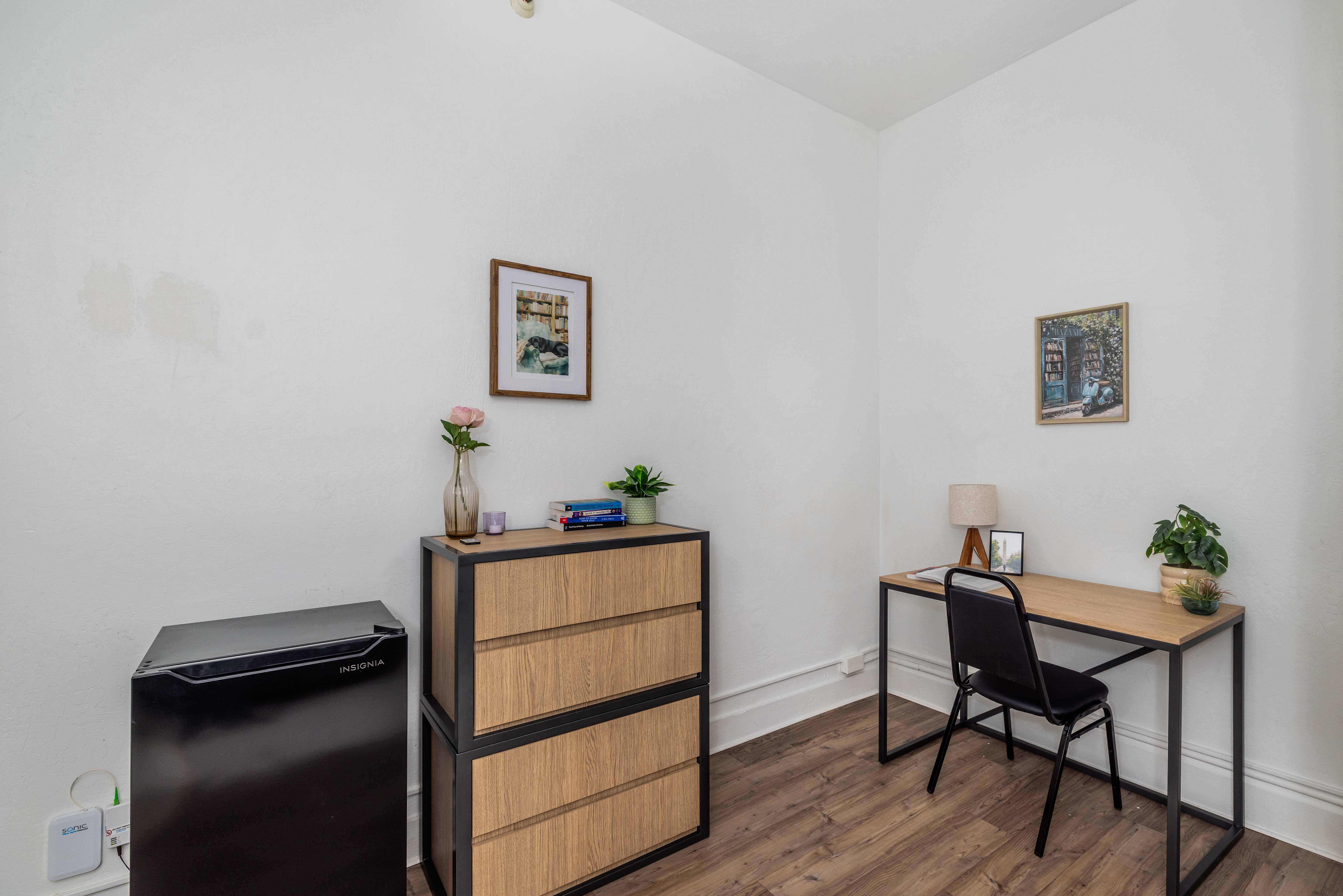 Standard room with desk and dresser
