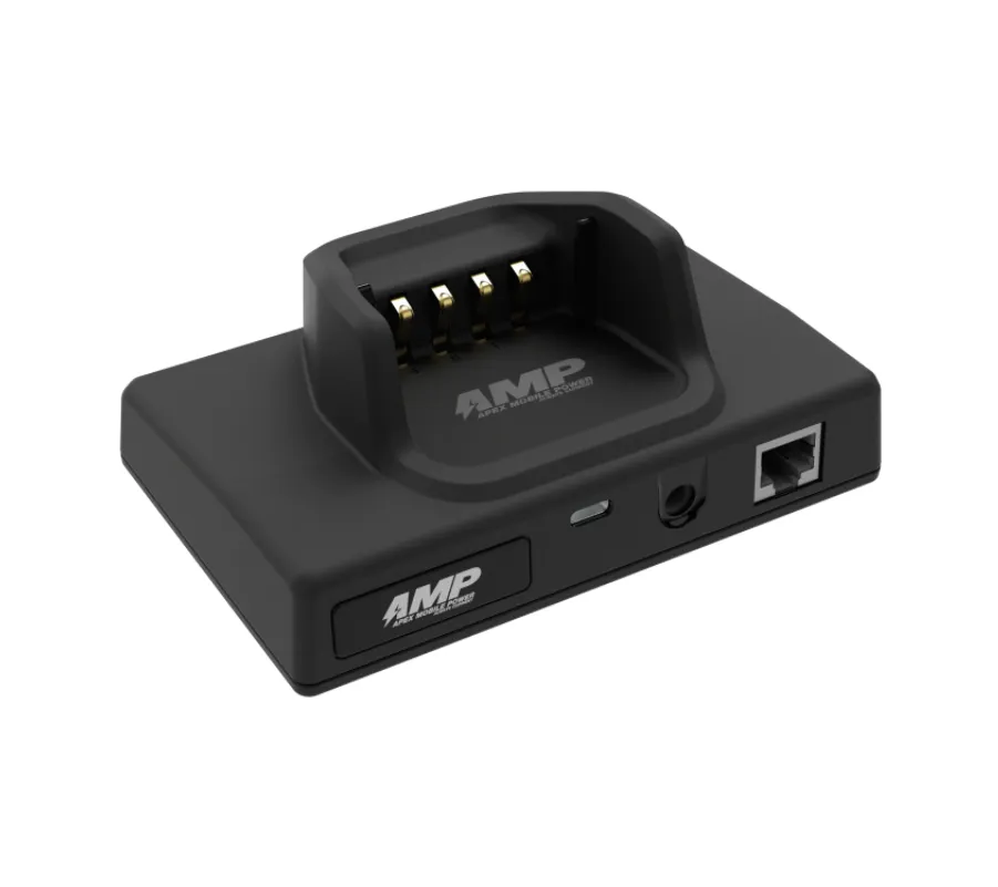 Black AMP Apex Mobile Power docking station with charging pins, USB-C, audio jack, and Ethernet port.