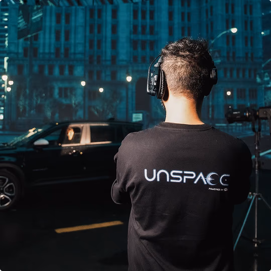 UNSPACE operator on LED stage filming nighttime car scene—2024 virtual-production showreel thumbnail.`