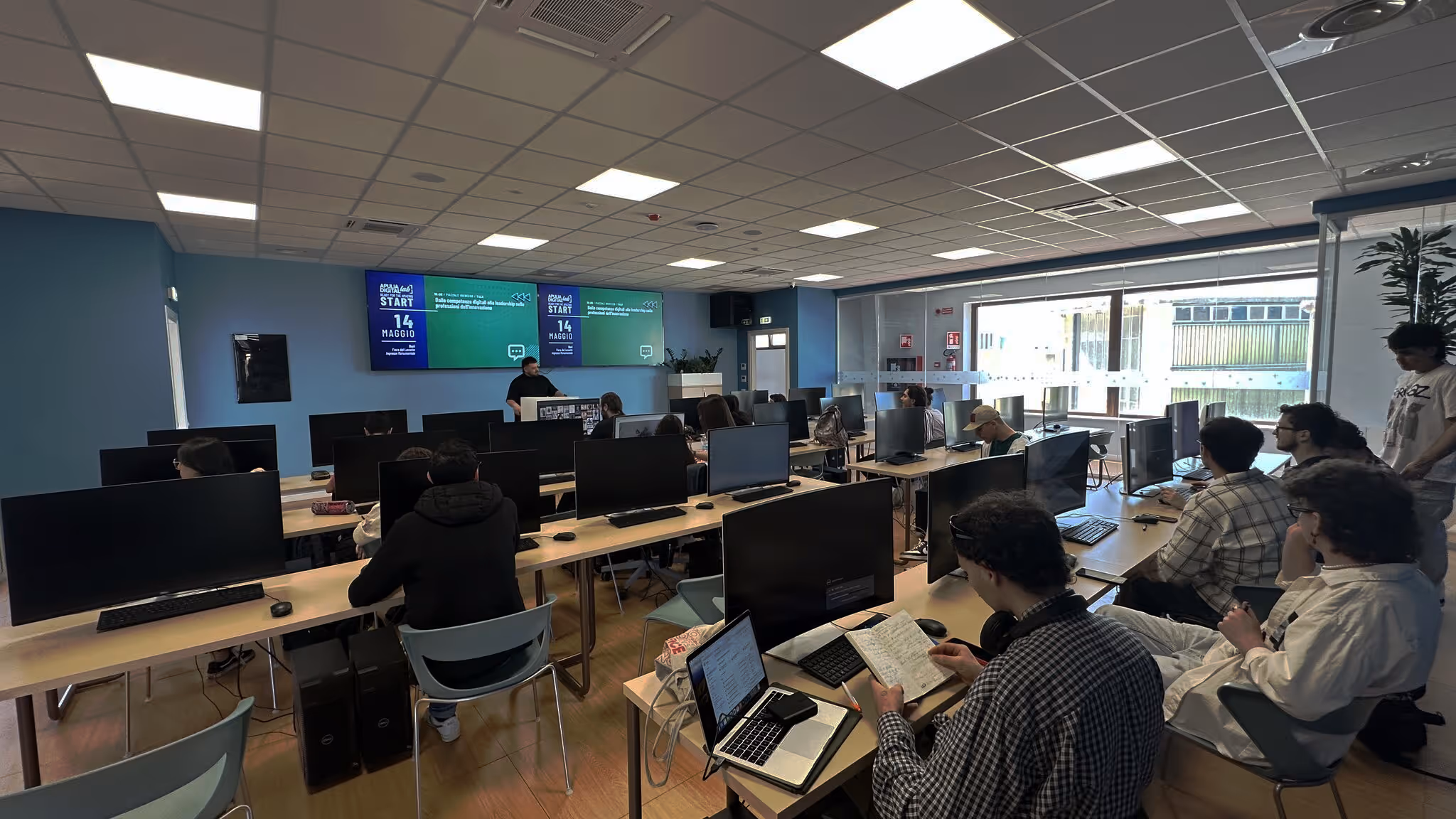 Students in UNSPACE Bari classroom following virtual-production lecture—hero image for Lab page.
