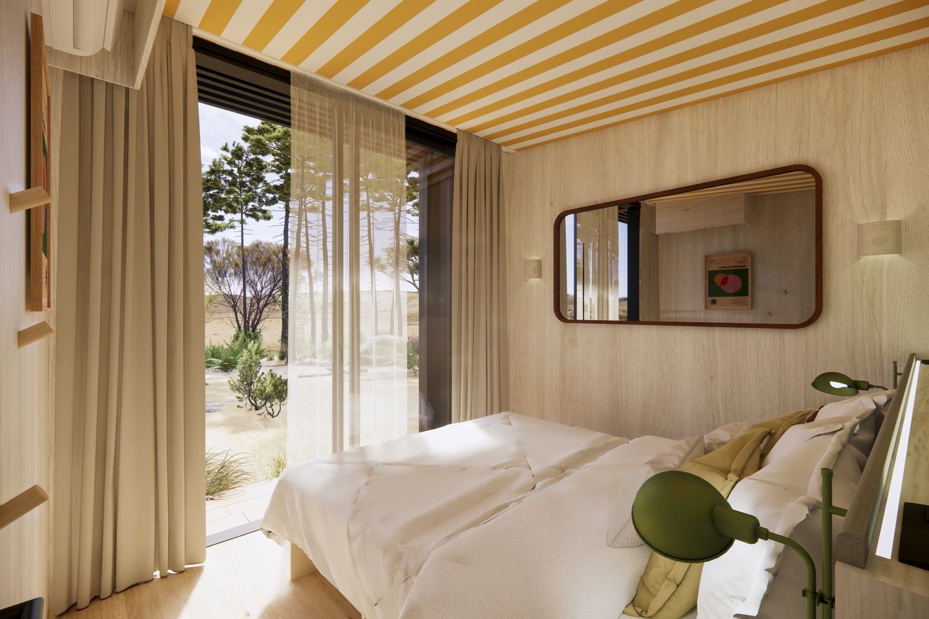 Lichte Mini Villa slaapkamer met tweepersoonsbed en uitzicht op de bomen door een erker