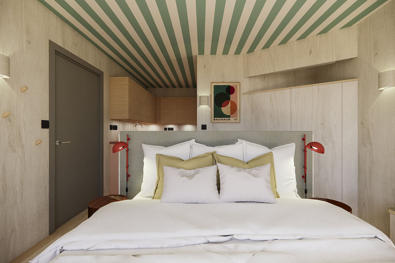 Modernes Schlafzimmer mit gestreifter Decke, Doppelbett und Küche auf der Rückseite.