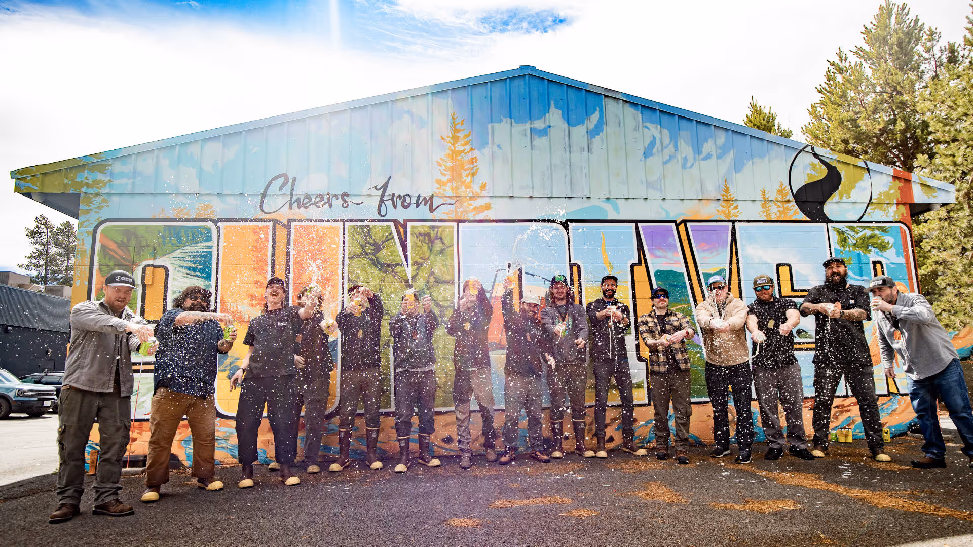A group of people standing in front of a building.
