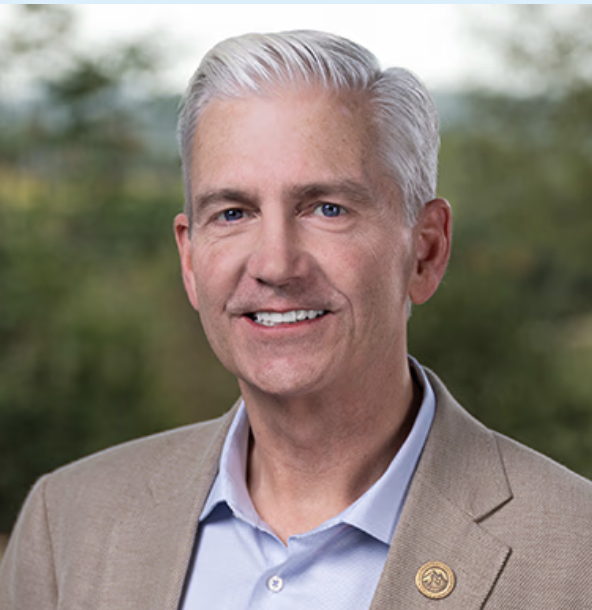 Image of John Kresky, a mature white man with short grey hair