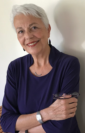 Dr. Sonia Nieto, scholar of multicultural education and 2026 Multilingual Education Hall of Fame inductee, smiling and navy blue shirt.