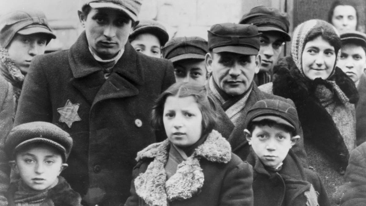 Jews wearing Star of David badges, Lodz Ghetto, Poland. The Nazis forced Jews into over-crowded ghettos from which thousands were deported to the death camps. (circa 1940). (Photo by Jewish Chronicle/Heritage Images/Getty Images)