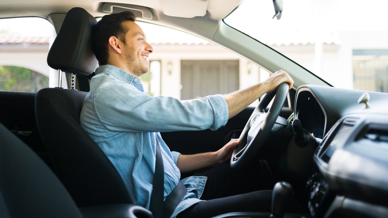 uber driver driving their approved car