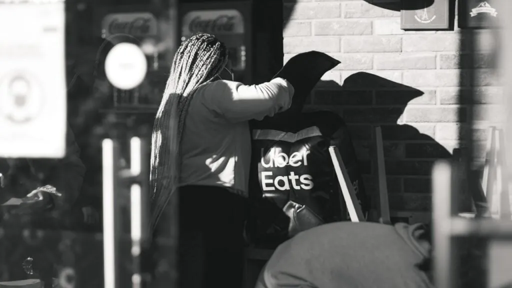 Uber Eats driver is packing up customers’ food for delivery