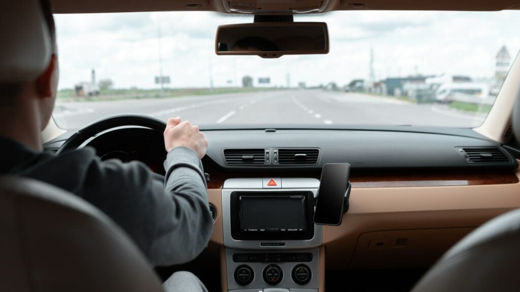 person driving their car getting car allowance