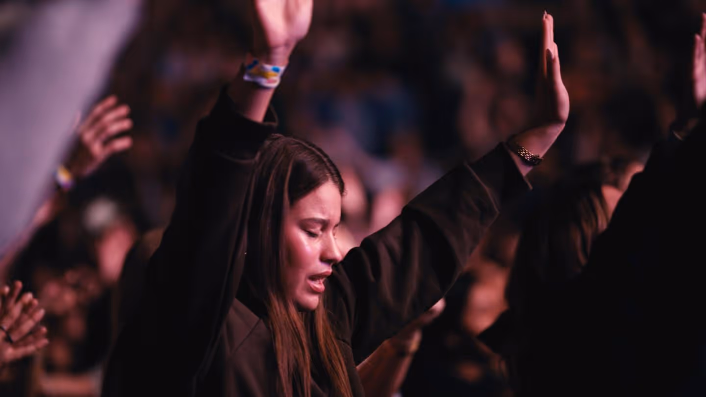 Woman being baptized at USF