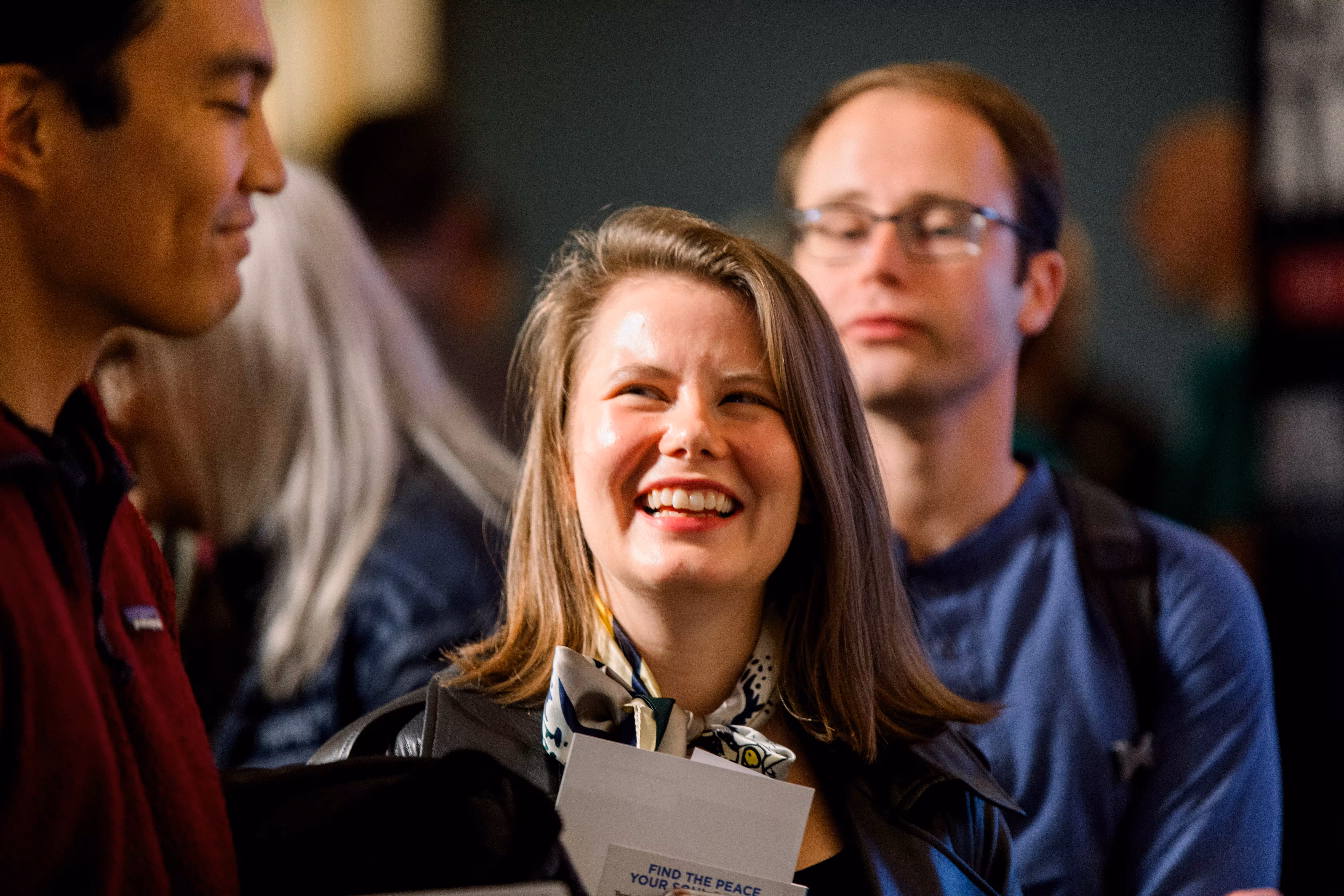 happy patrons smiling at AWAKE Boston