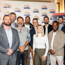 A group of believers and leaders gathered with joy and purpose, united to advance the mission of awakening America.