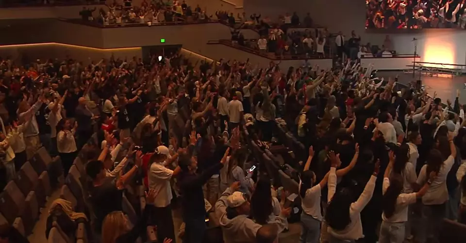 Students in fervent worship during Holy Spirit outpouring at Florida campus, echoing the momentum of the Asbury revival