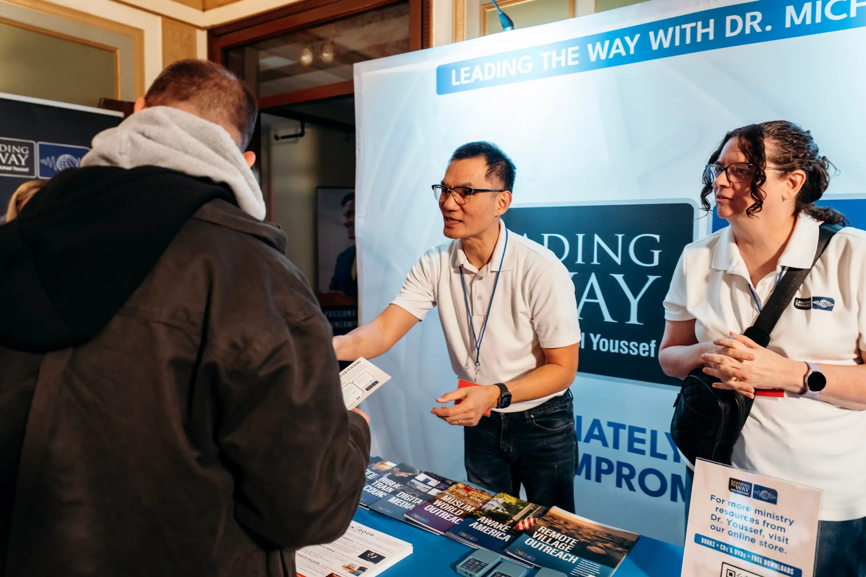 Leading The Way ministry booth with volunteers at AWAKE America Boston rally