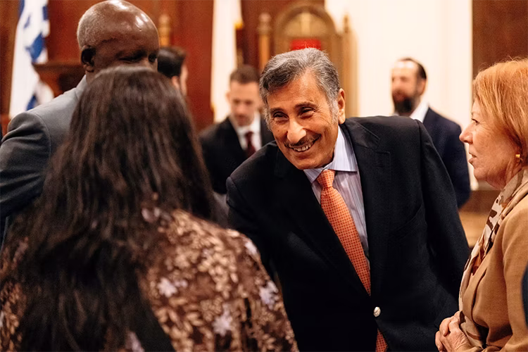 Dr. Michael Youssef smiling and greeting attendees at AWAKE America Boston rally
