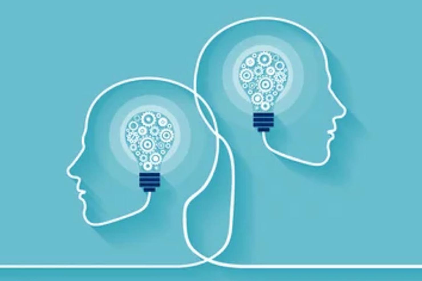 Illustration of two human head outlines facing opposite directions, with overlapping light bulbs filled with gears inside each head, representing shared knowledge, innovation, and collaborative thinking.