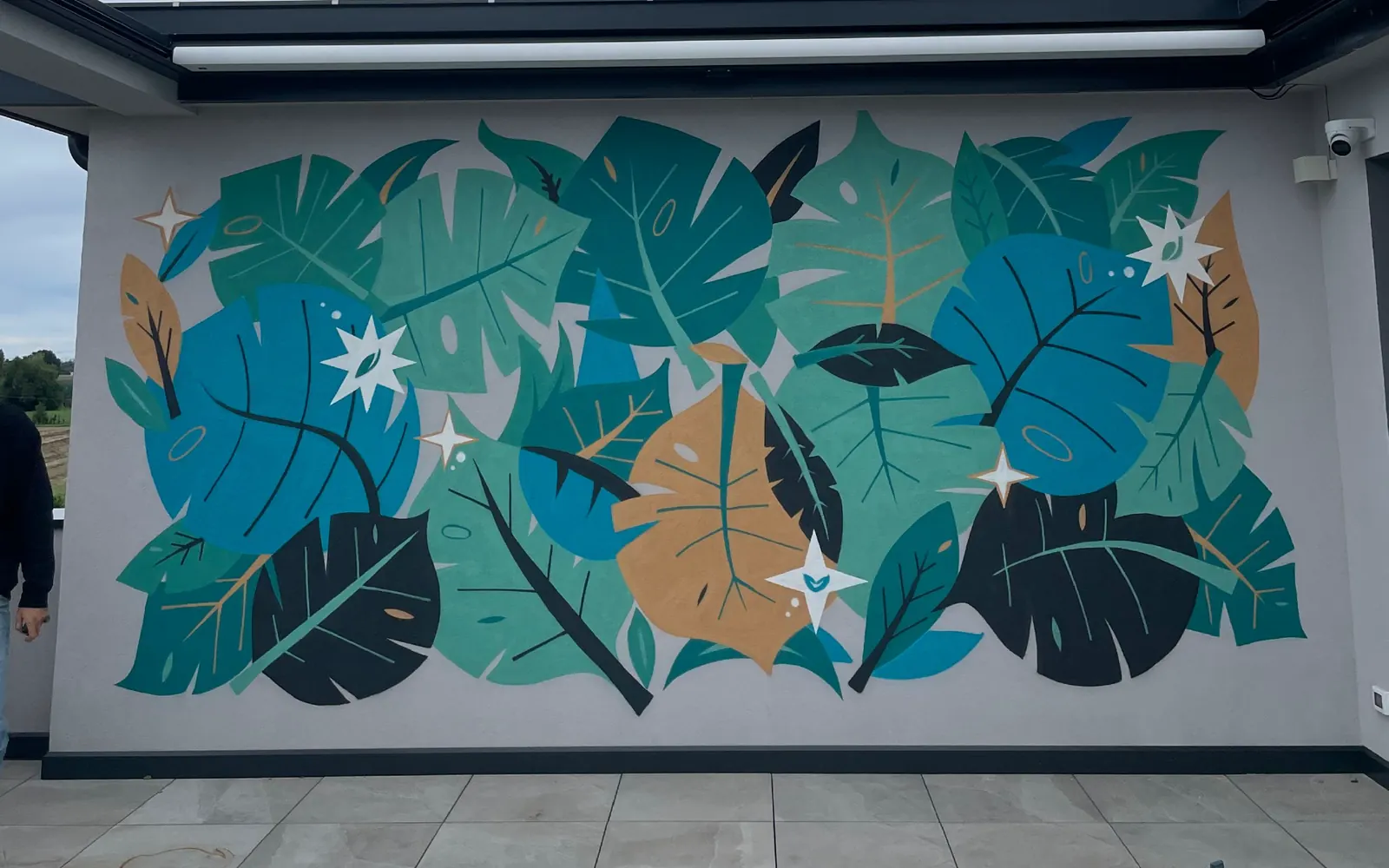 Murales Attico: Eleganza e natura in quota