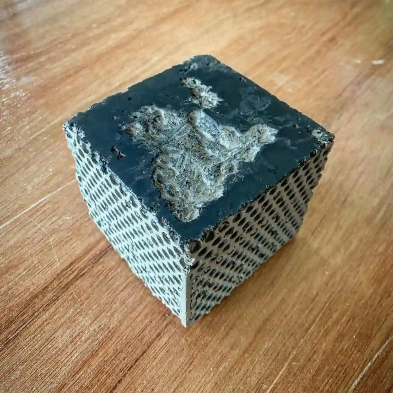 A construction block made, in part, with biochar.