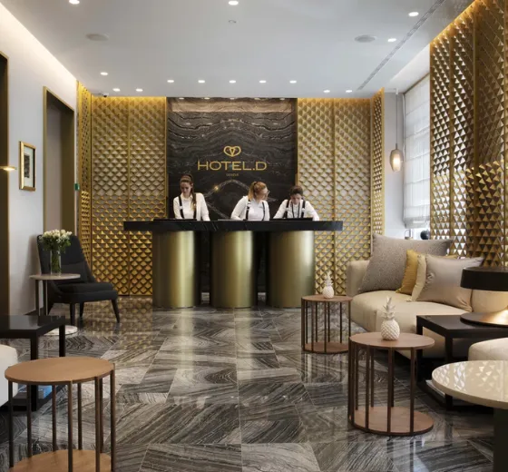 Accueil discret et service haut de gamme à la réception de l’Hôtel D. Genève pour vos événements avec INÜI Collection.
