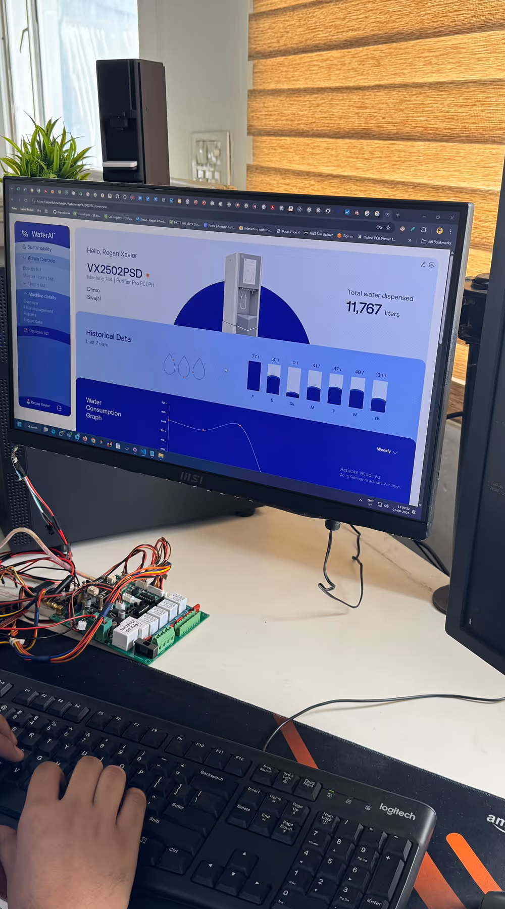 A person on a desktop working on the WaterAI app