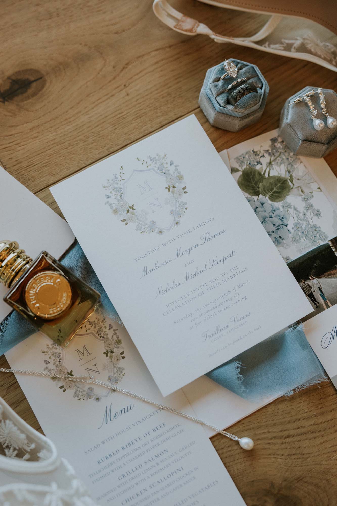 Wedding menu card from Trailhead Venues with floral accents.