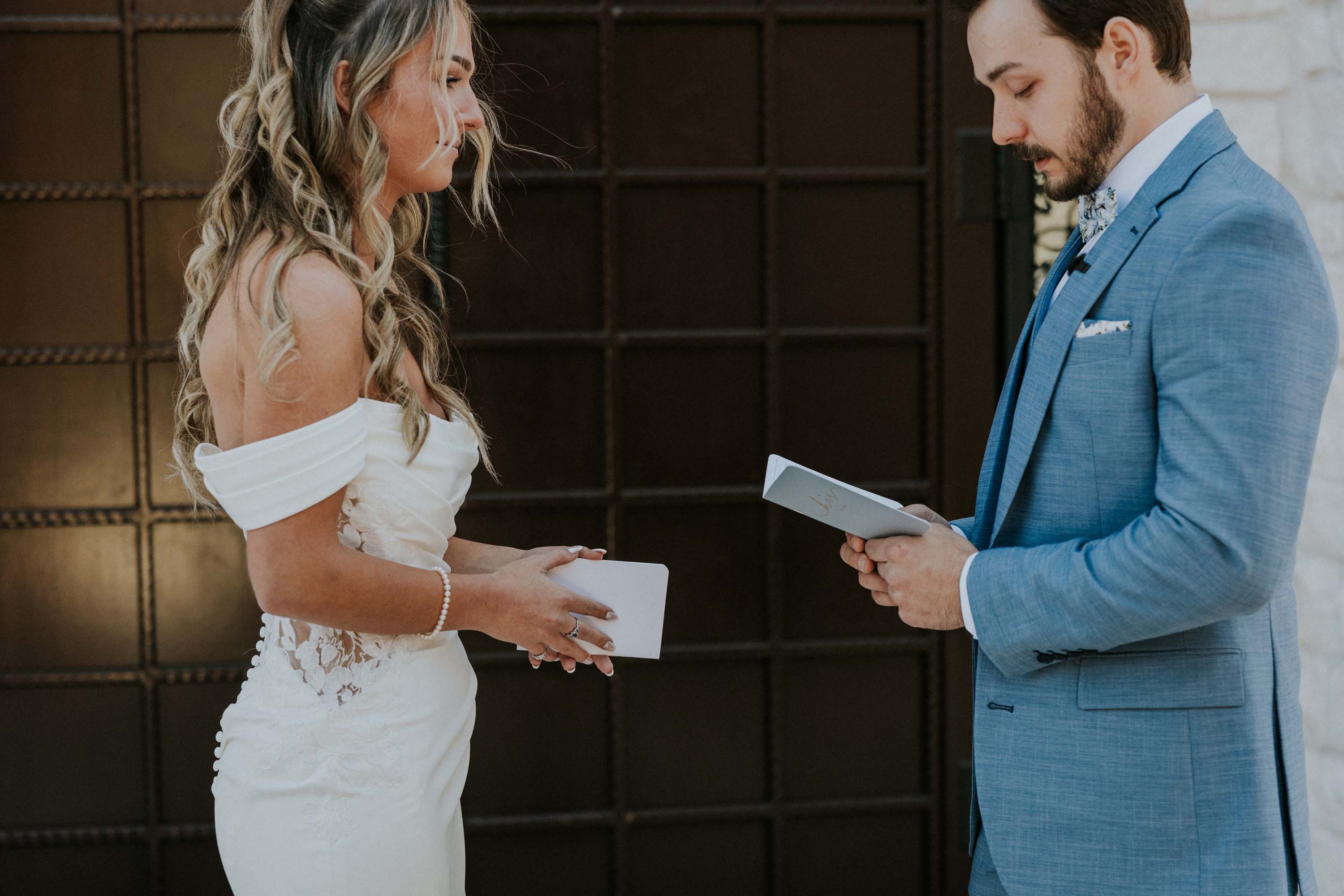 Bride and groom exchange vows in a beautiful setting at Trailhead Venues.