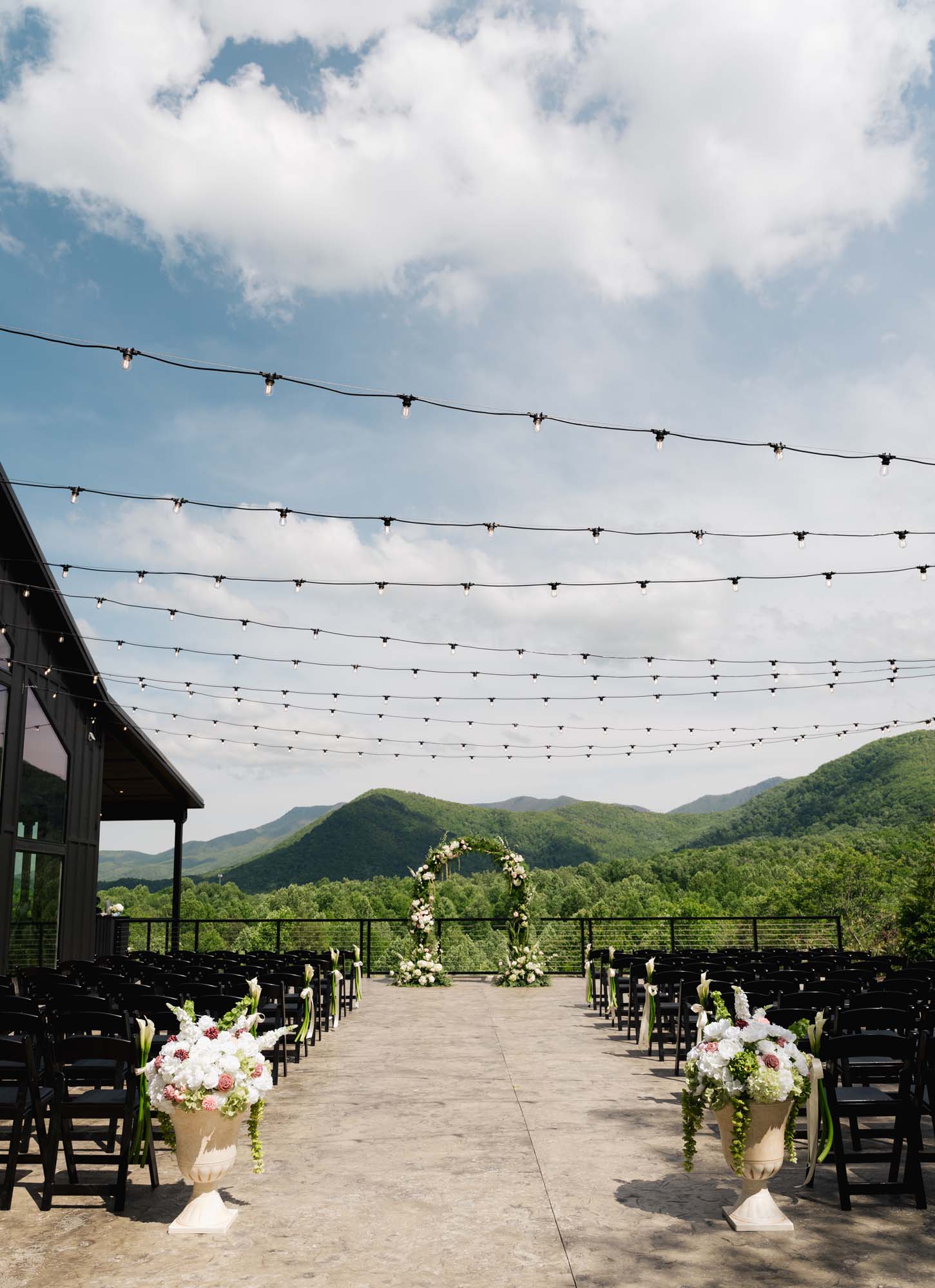 Outdoor wedding ceremony setting at Trailhead Venues with mountain backdrop.