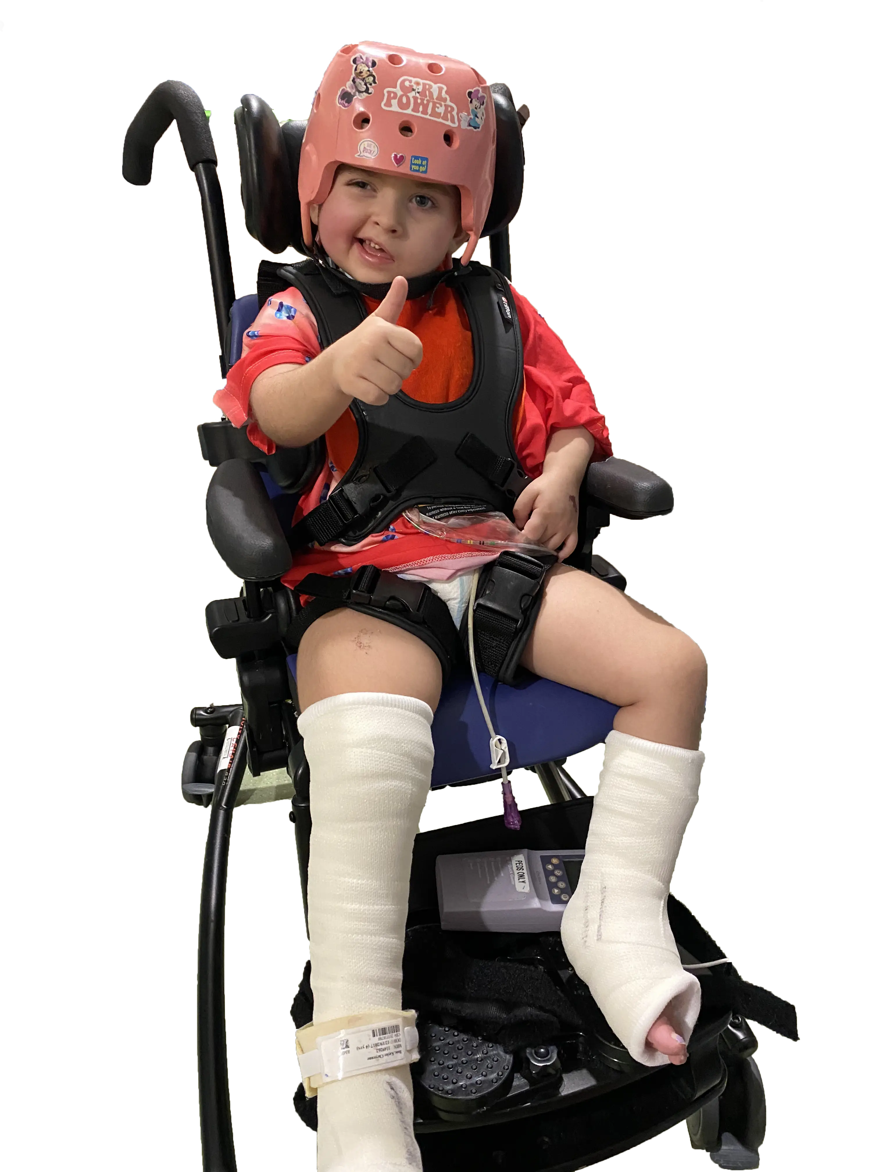 child with a thumbs up and AT devices.