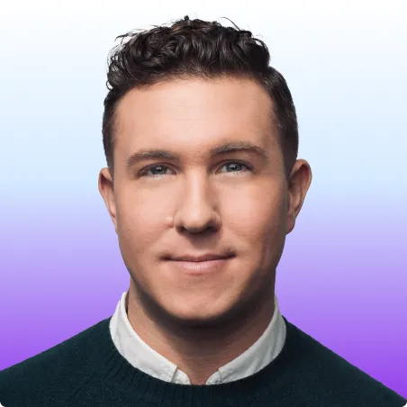 Headshot of a man with short curly hair wearing a dark green sweater and white collared shirt, against a blue and purple gradient background.