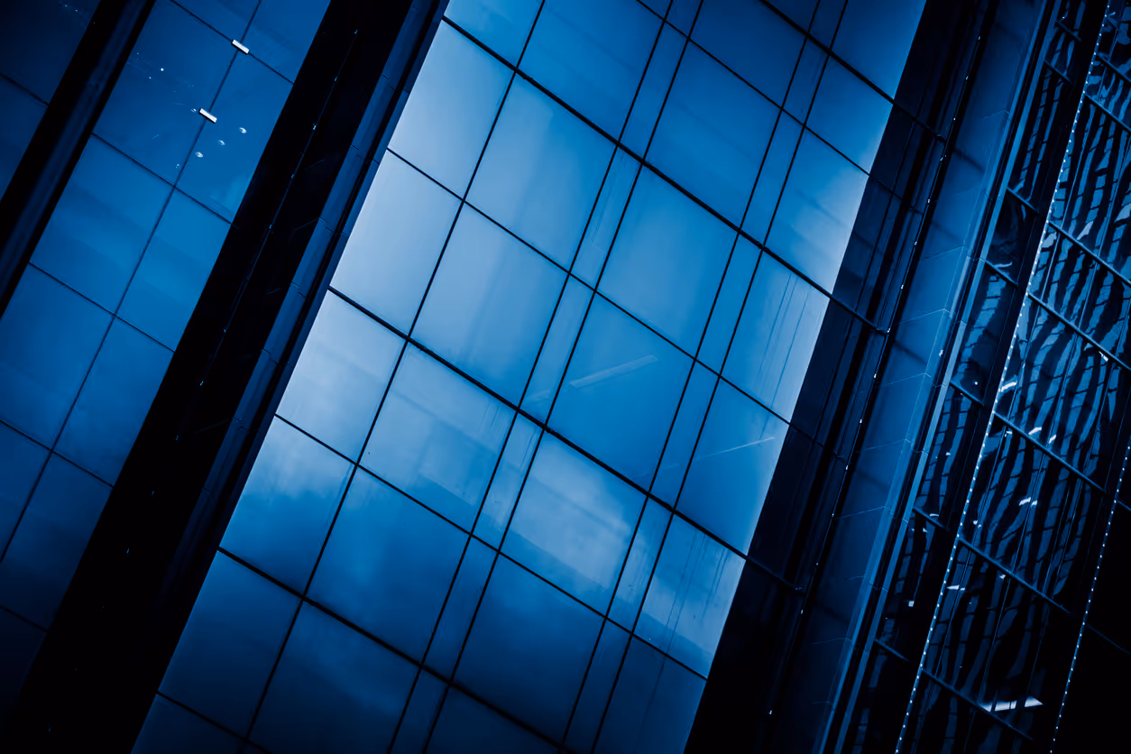 Blue glass facade of modern skyscraper