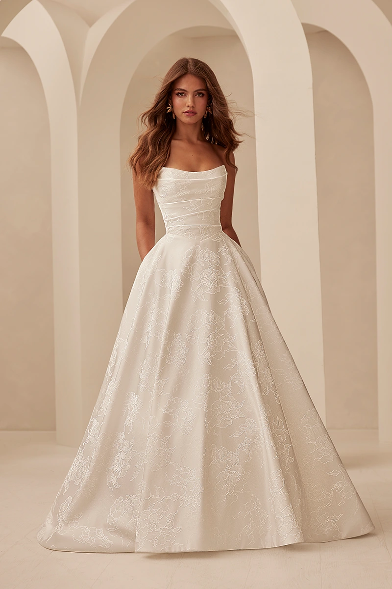 Strapless jacquard wedding dress with pockets and detachable bow