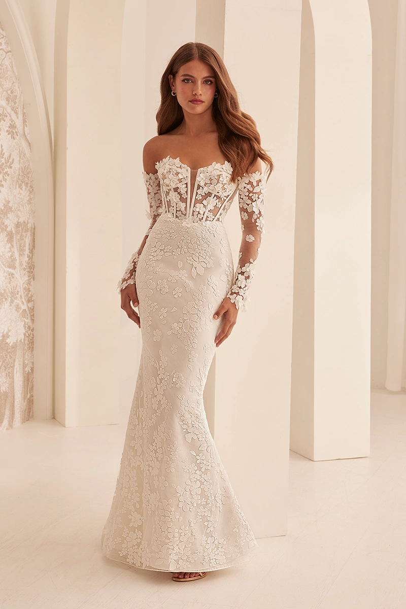 Strapless fit and flare wedding dress with a sheer off-shoulder bodice, floral lace appliqué sleeves, and embroidered skirt.