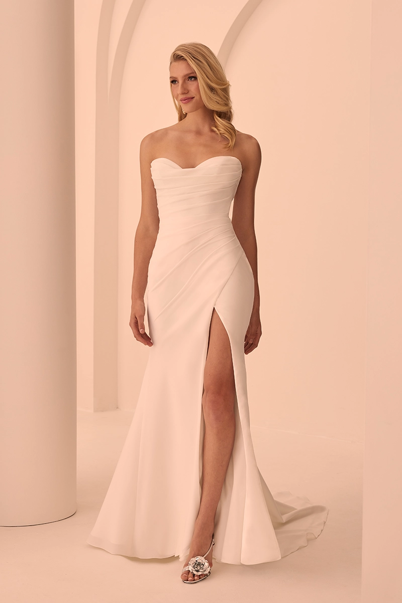 Draped crepe fit and flare wedding dress with sweetheart neckline and slit
