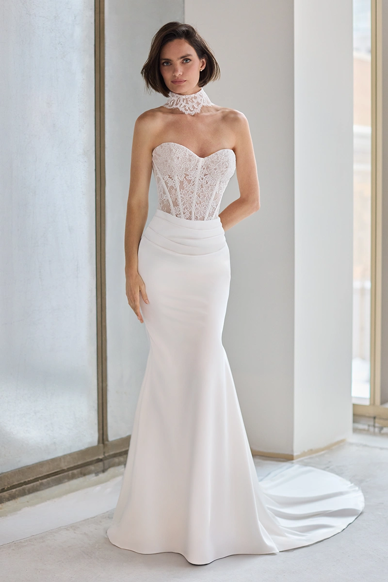 Strapless Lace and Charmeuse gown with a sheer Lace corset bodice with a sweetheart neckline, a Lace choker, and a draped fit and flare Charmeuse skirt.