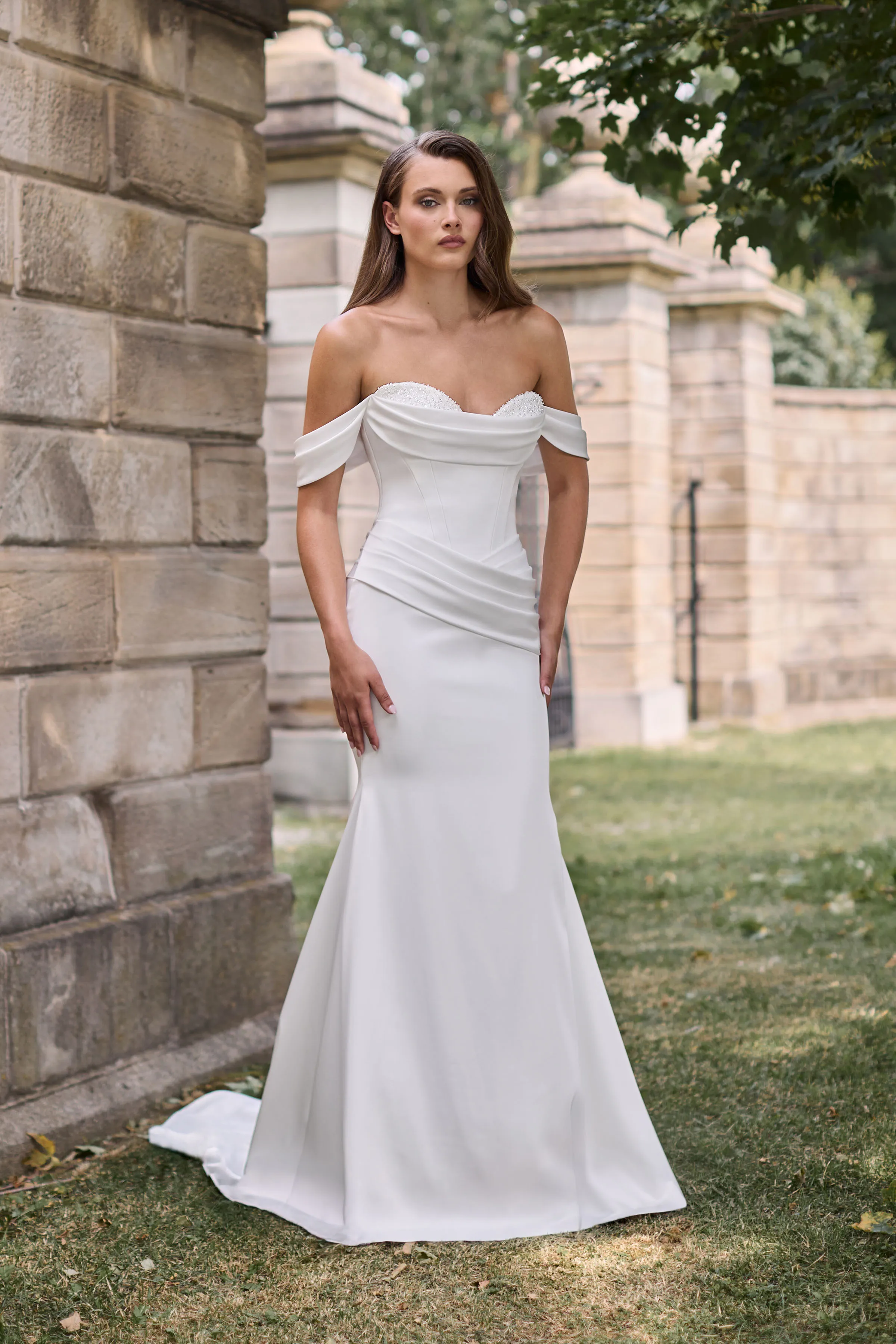 Strapless Charmeuse gown with Beaded Tulle sweetheart and draped neckline and waist, with draped sleeves and fitted skirt.