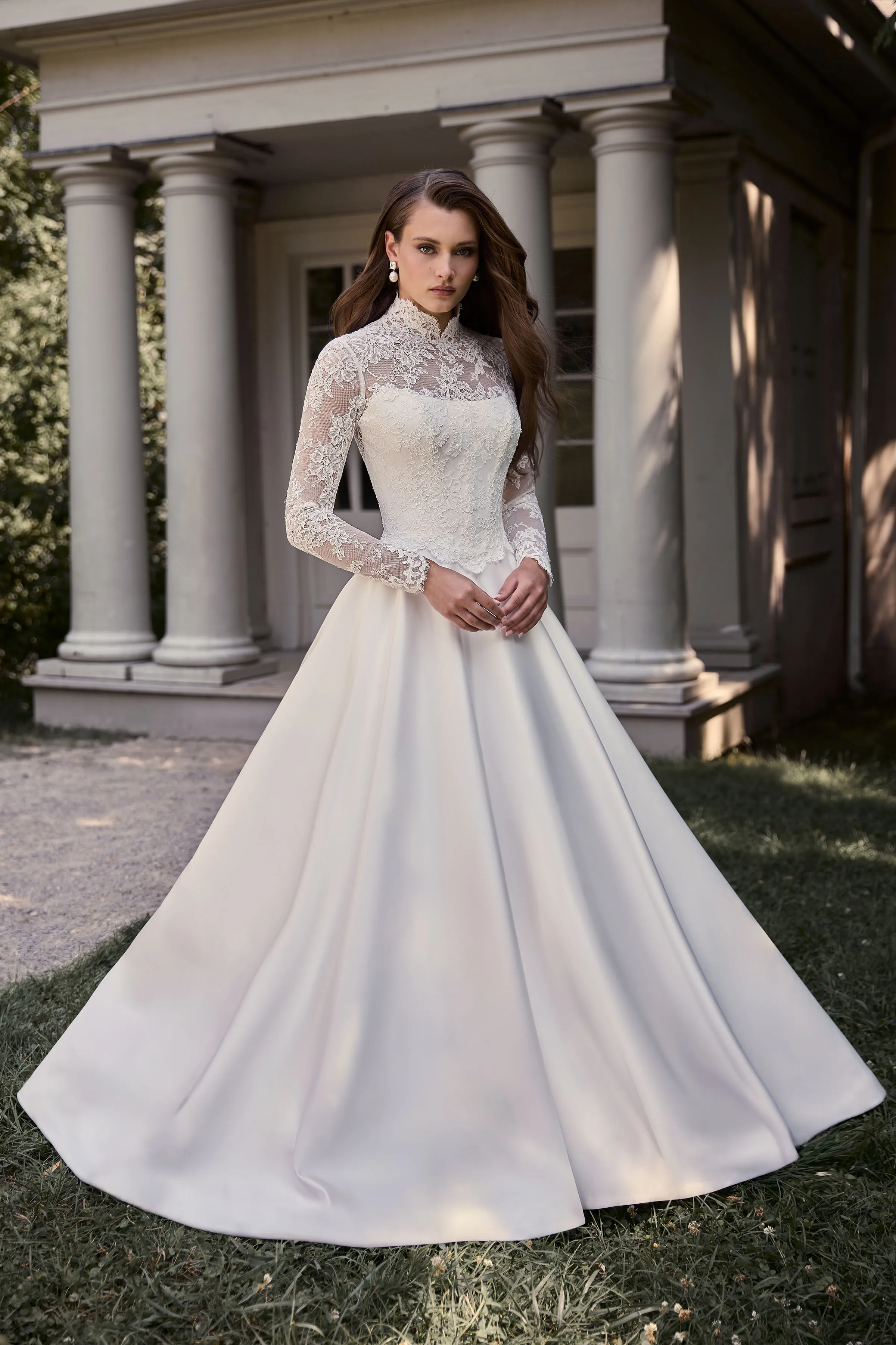 Satin gown with a long sleeve Lace bodice and high neckline, with a scoop neckline on lining and full Satin skirt.
