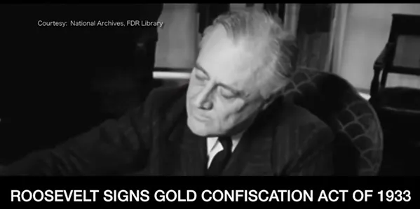 Roosevelt signing the GOld confiscation act of 1933