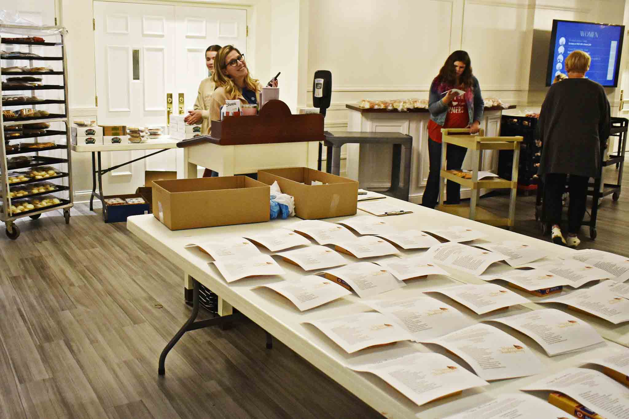 Evermore Church Women’s Ministry volunteers preparing food donations, serving with compassion, and building community in Hartville, Ohio.