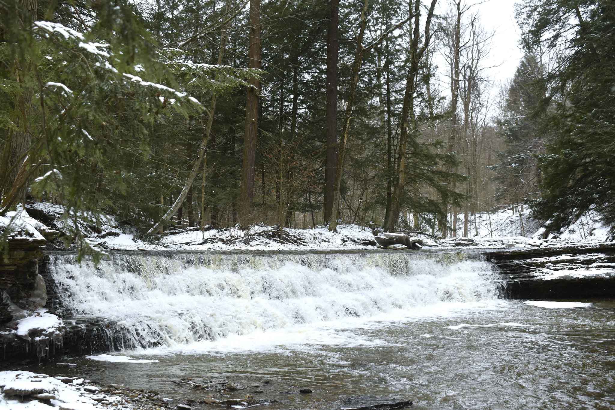 Winter retreat waterfall scene representing Men’s Ministry fellowship and spiritual renewal with Evermore Community Church in Hartville, Ohio.