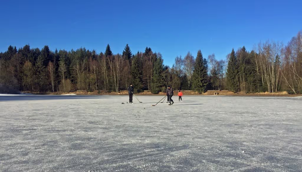 Ice-skating at the local pond nearby Prague