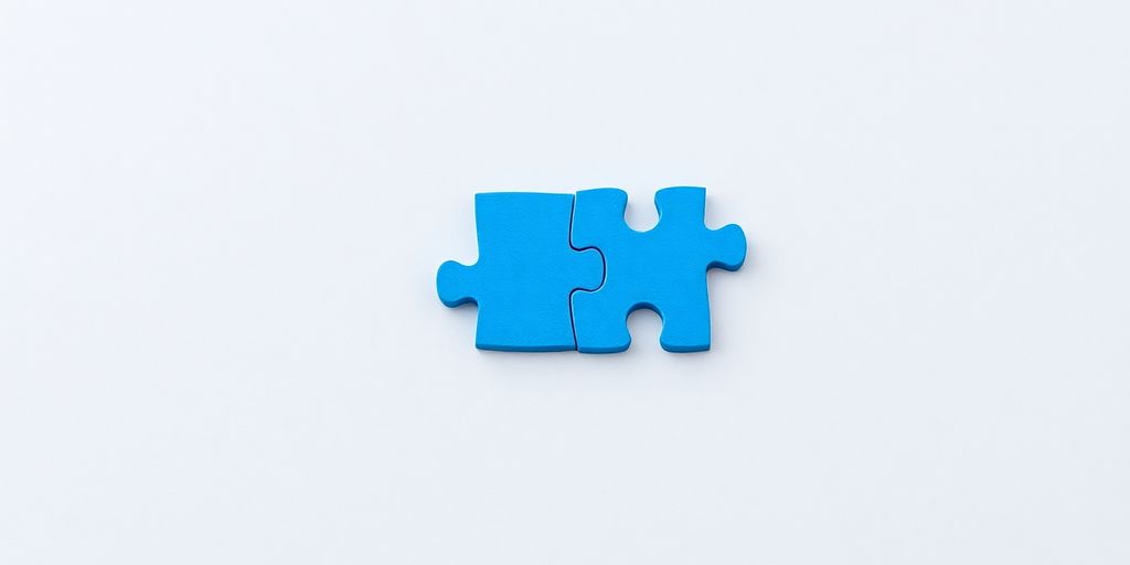 Puzzle pieces fitting together, one blue, one green.