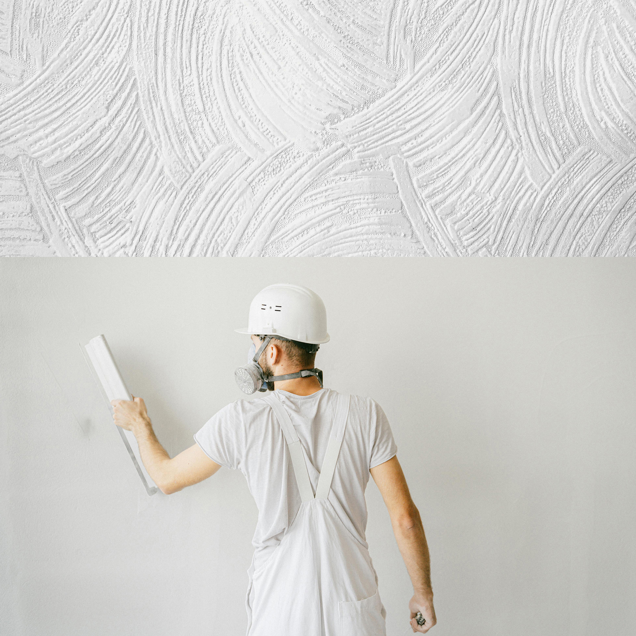 Painter painting White Wall