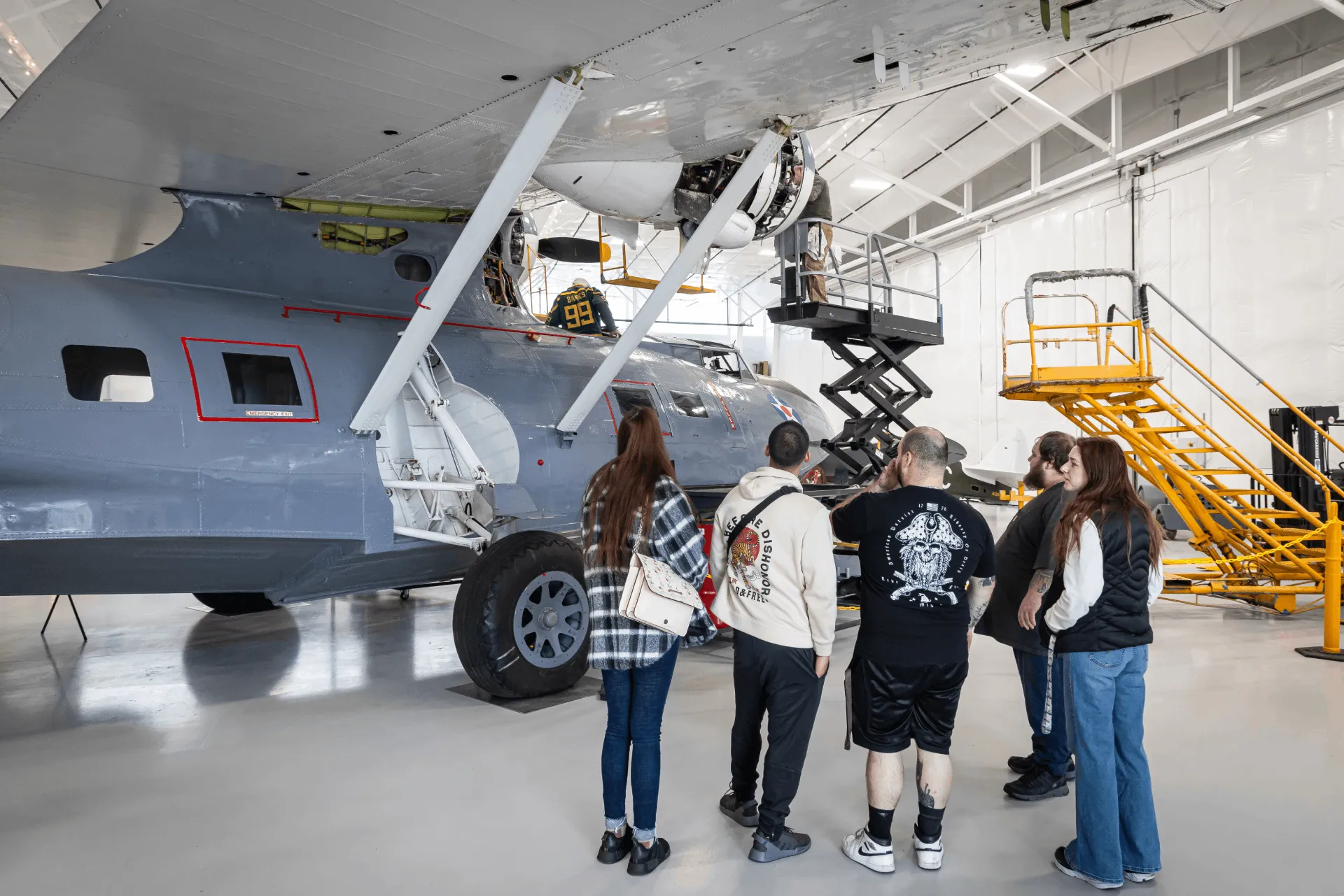 People looking at Soaring by the Sea Foundation's 1943 PBY-5A Catalina