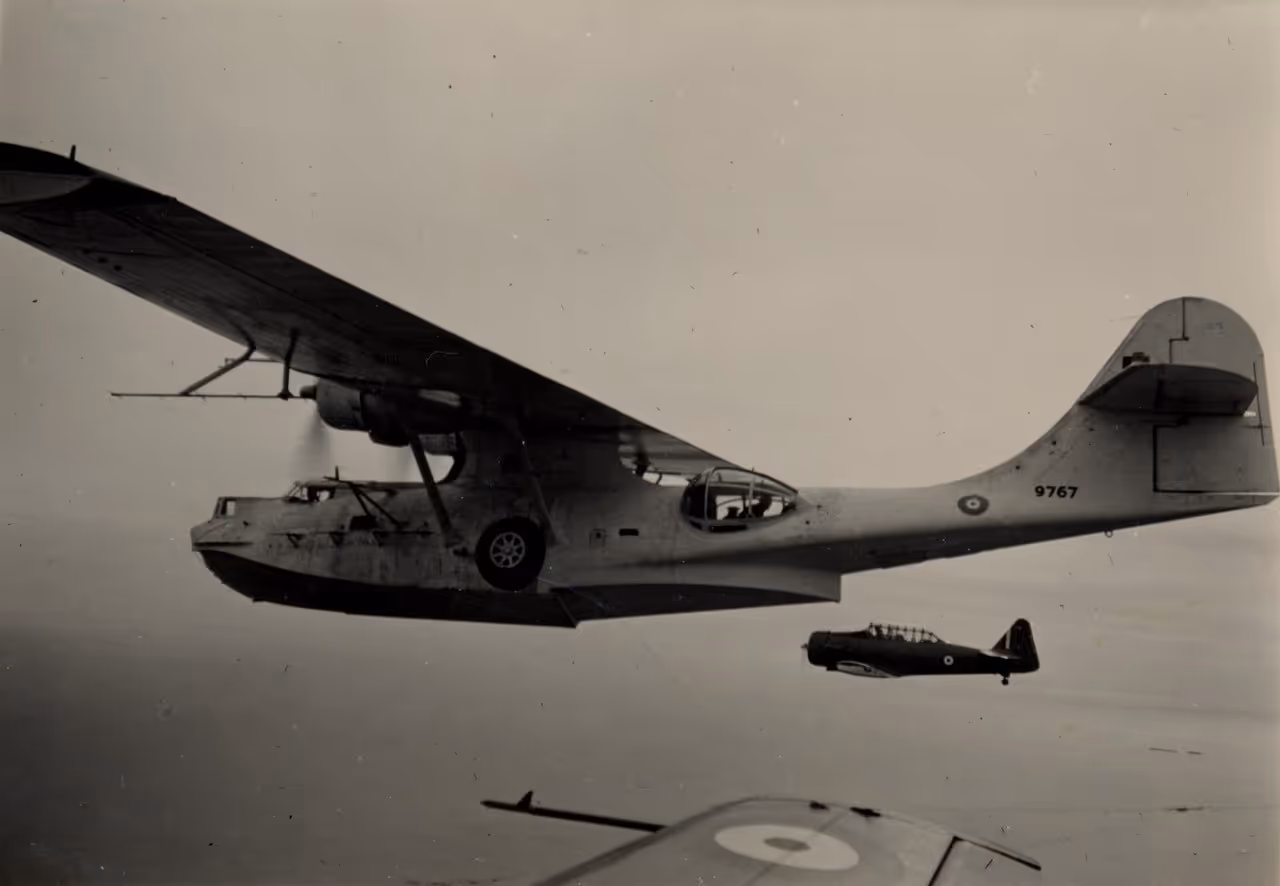 PBY-5A Catalina flying with other war aircrafts during WWII