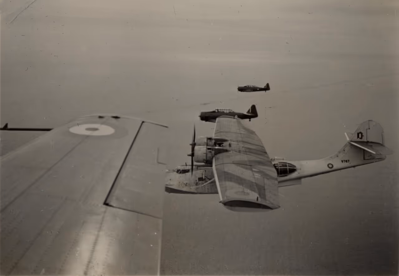 PBY-5A Catalina flying with other war aircrafts in WWII