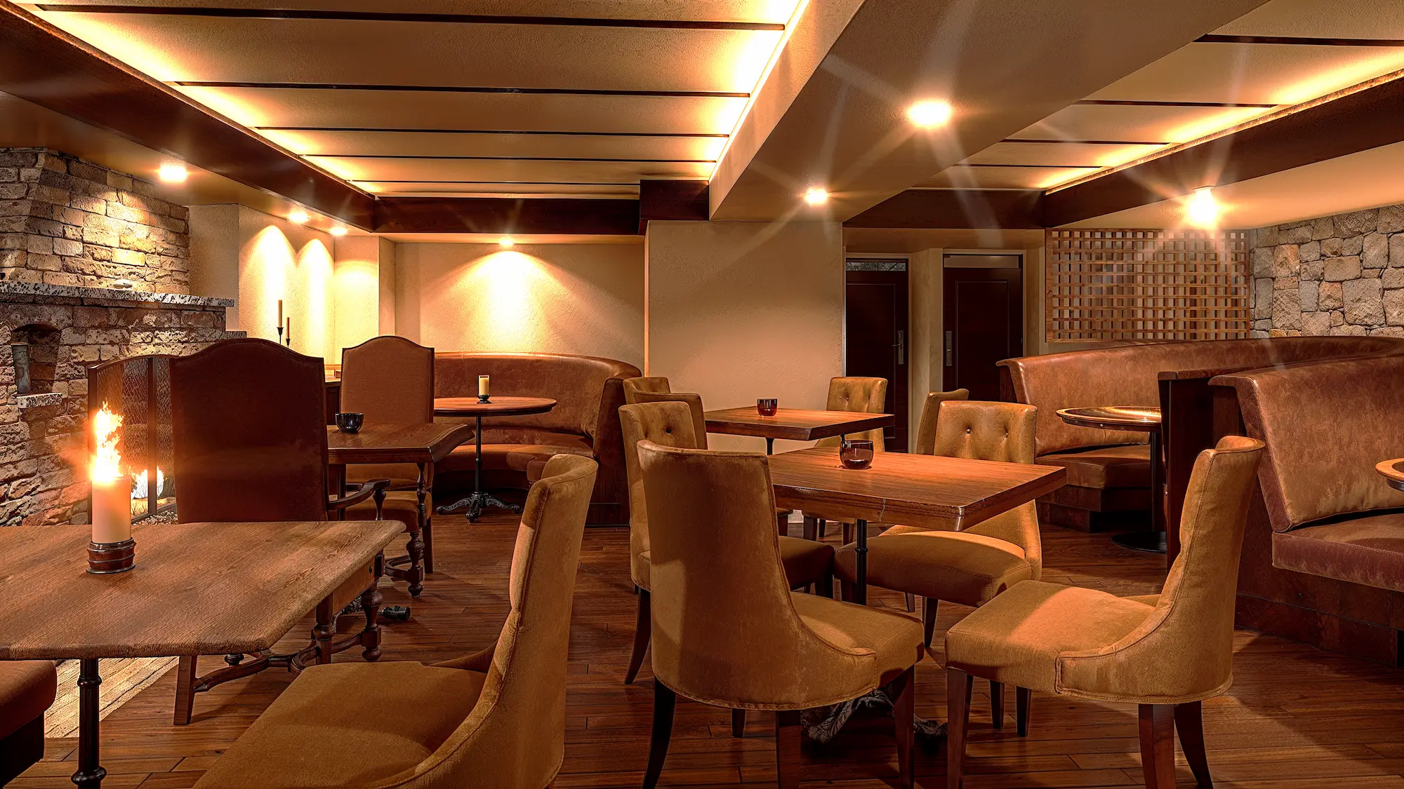Hogsbeath Inn, Carmel-by-the-Sea, CA interior of the restaurant area redesigned by Julia Correia showing more modern finishes and updated light fixtures
