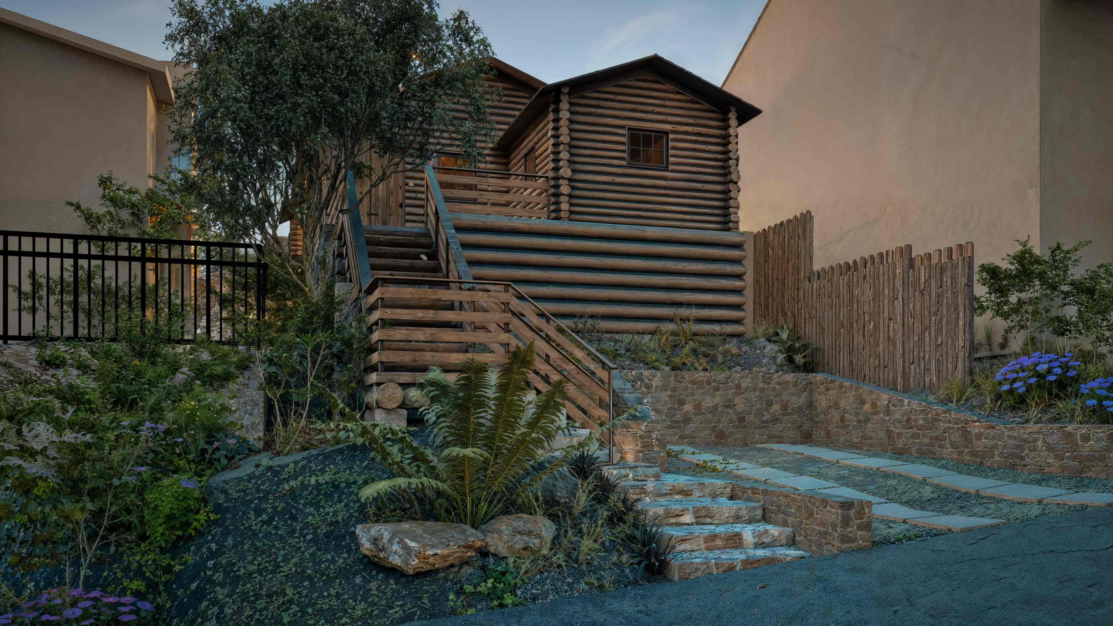 Dusk rendering of the reconstructed Jeffers log cabin seen from the street, up the entry stairs, Carmel-by-the-Sea