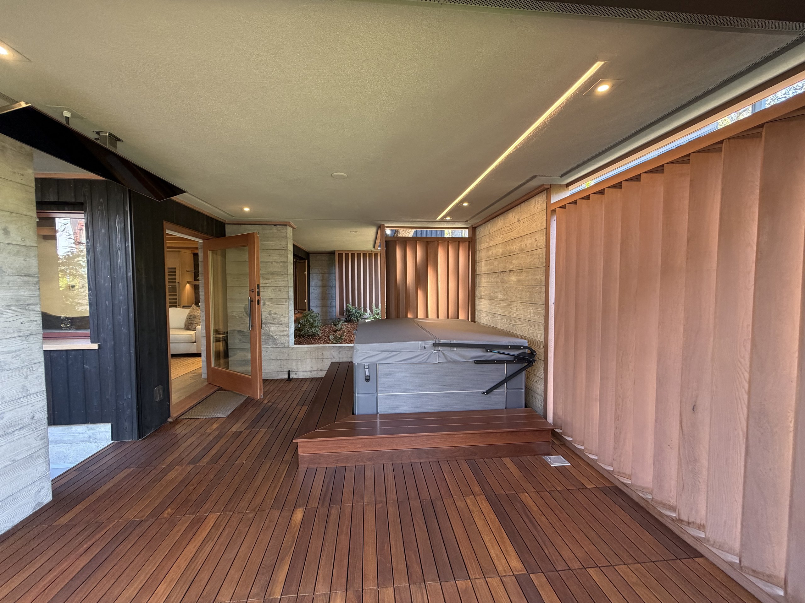 Covered spa deck at Brisa with hot tub, ipe decking, and cedar brise screens